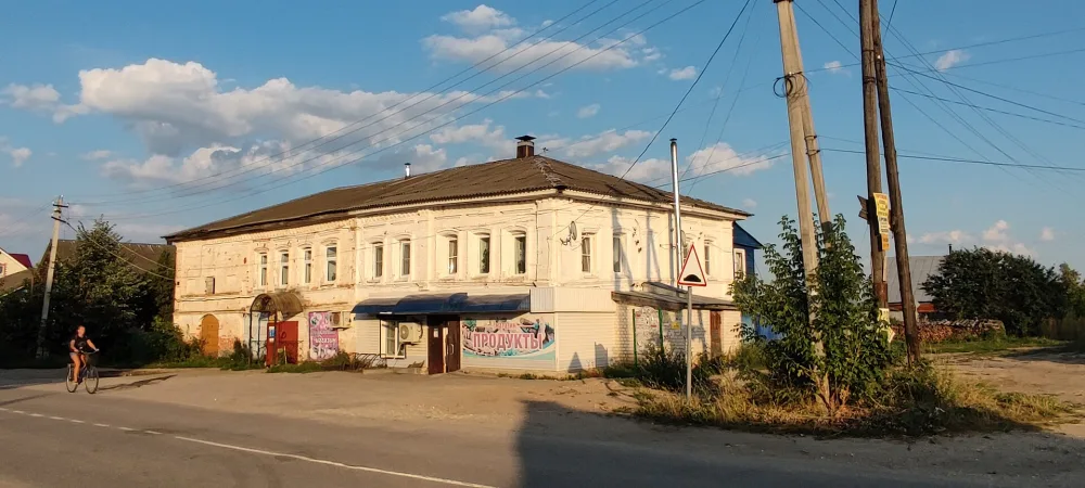 Жилой дом с торговым помещением (Пурех)