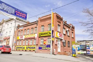 Дом, построенный в стиле чистого «модерна» в кирпиче (Курган)